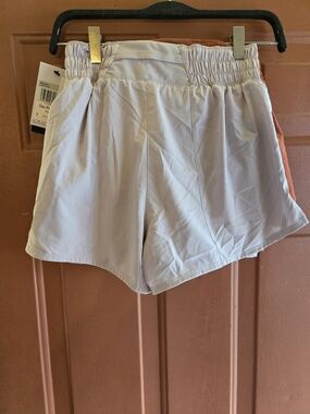 Nike Lavender Elastic Waist Athletic Shorts.  You Will Be Getting 2 Pr. Shorts.